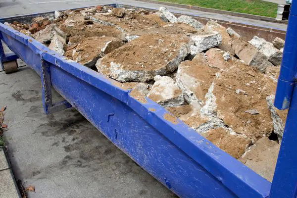 dumpster with construction debris